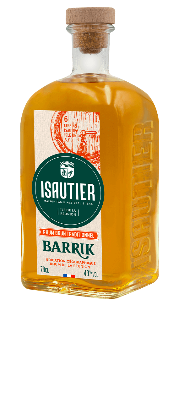 Vue rapprochée de la bouteille Isautier Barrik montrant l’étiquette et le relief du verre.